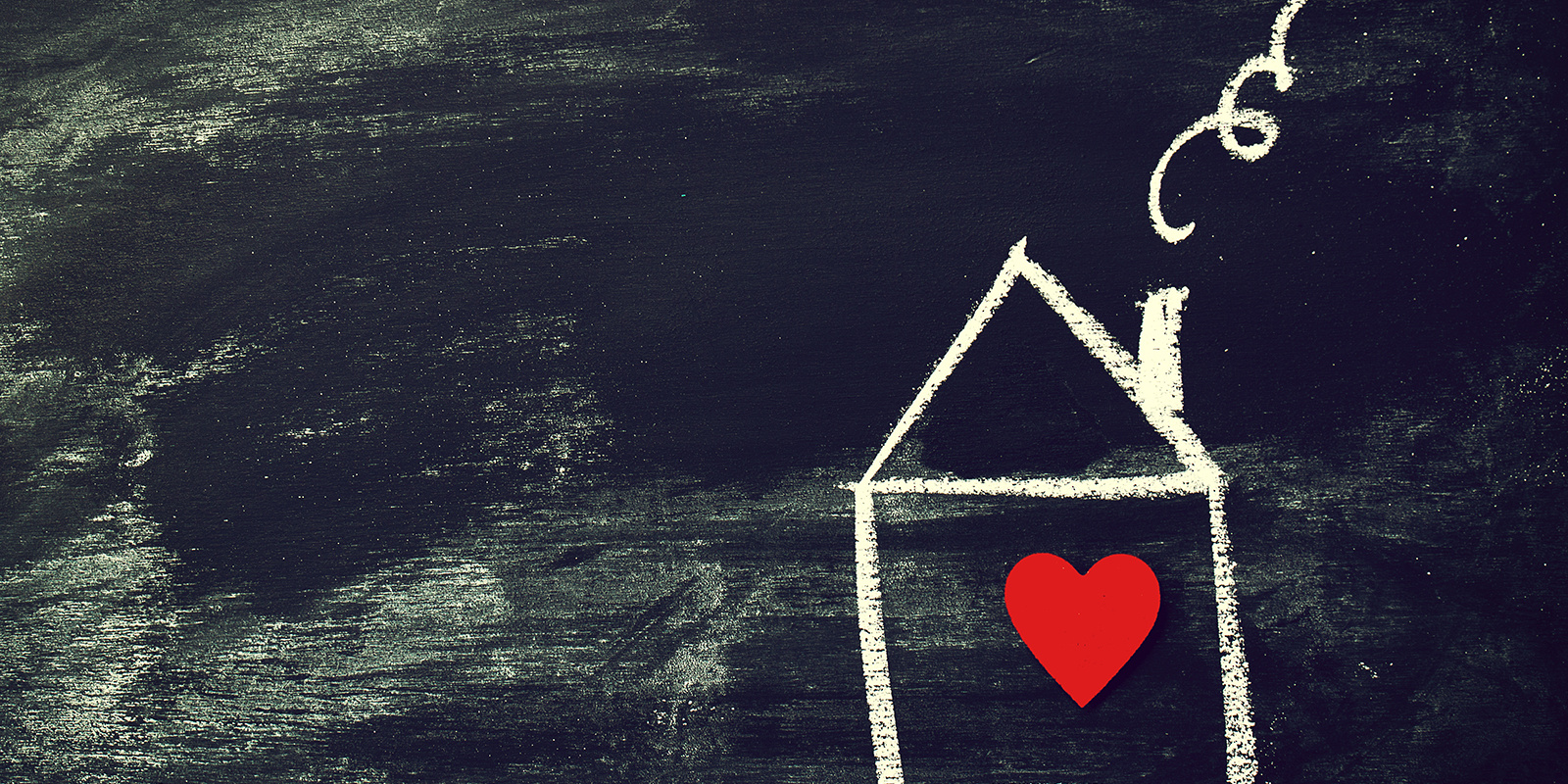 Home or Love Concept. Painted House with Red Heart on a Black Ch